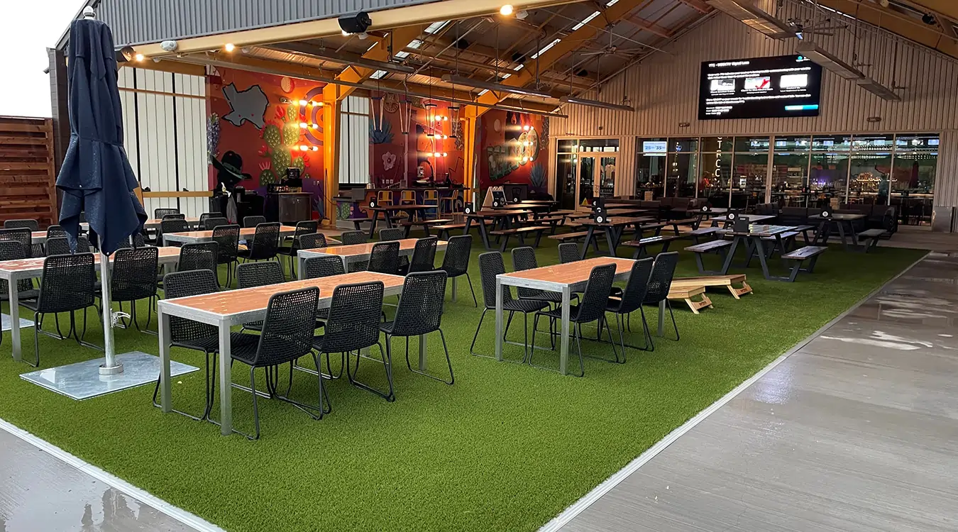 Commercial dining area with artificial grass