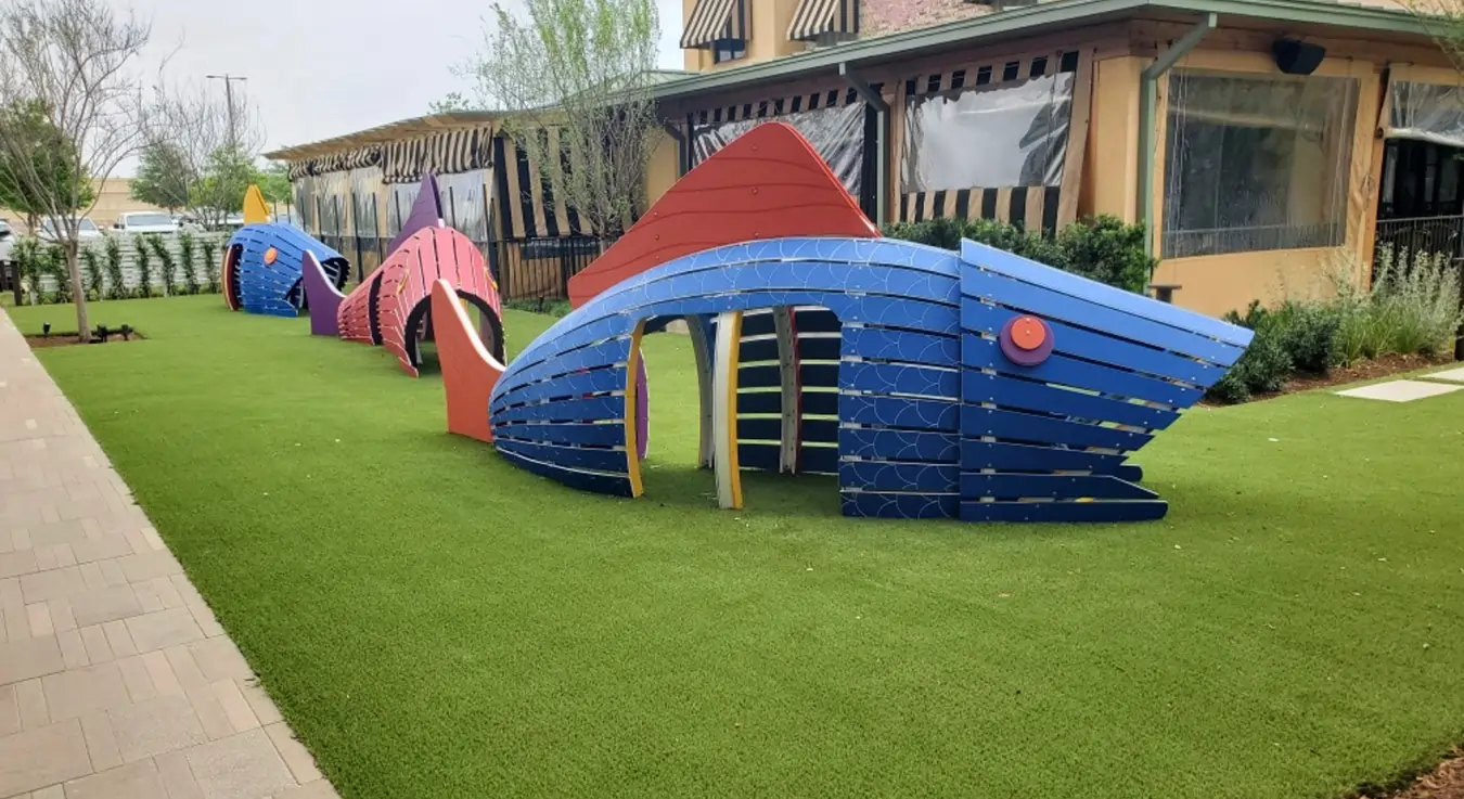 playground equipment installed on SYNLawn artificial grass