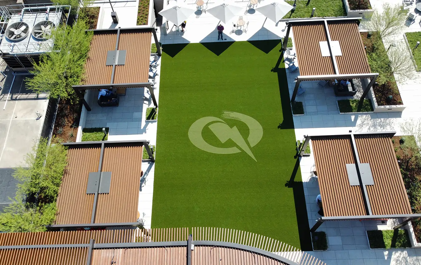 Drone shot of a commercial rooftop with artificial grass