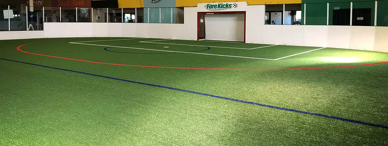 Indoor artificial turf practice facility