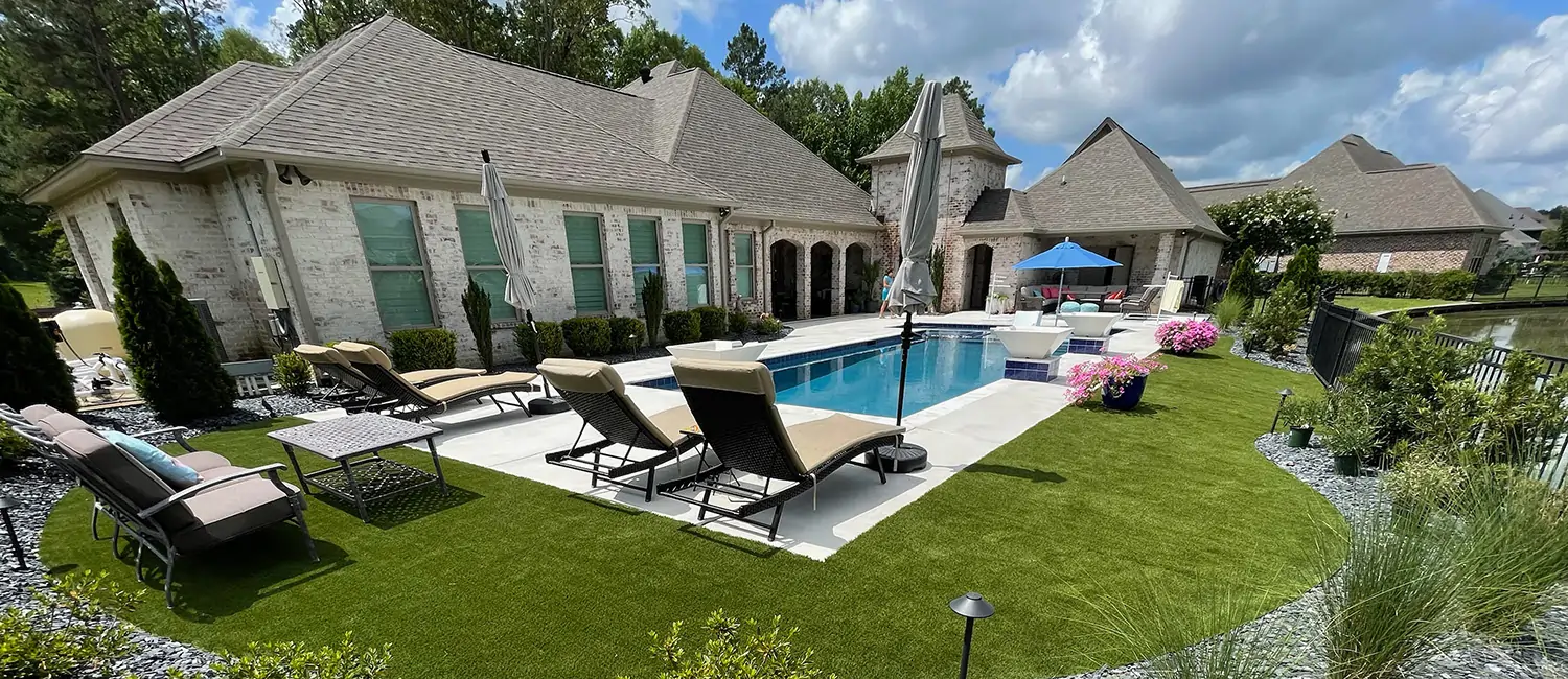Backyard artificial grass lawn & pool area