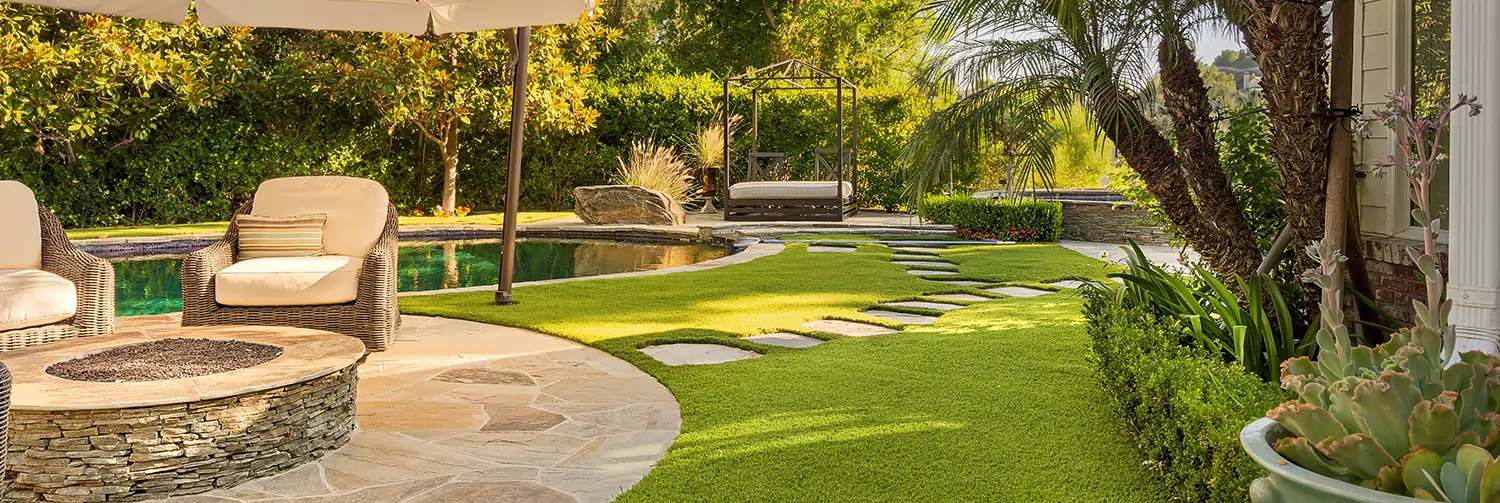 Backyard artificial grass pool area installed by SYNLawn