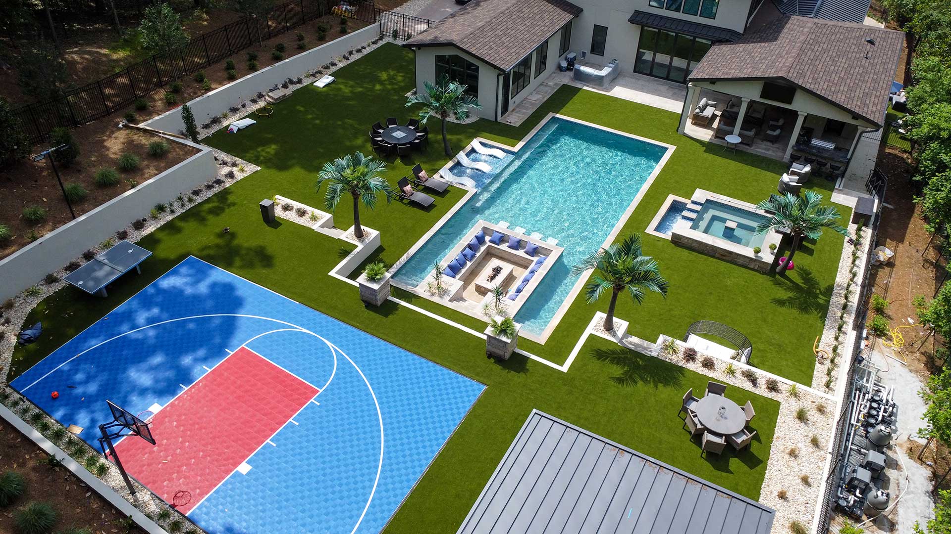 Artificial grass installation pool drone shot